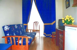 book Apartamentos y Suites Pegaso